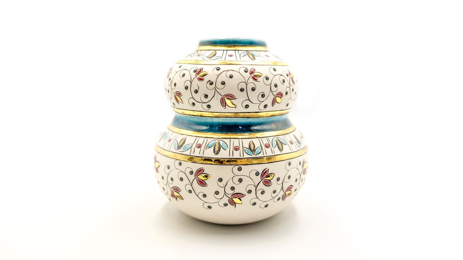 Double-stacked ceramic vase with intricate floral patterns and gold accents on a white background.